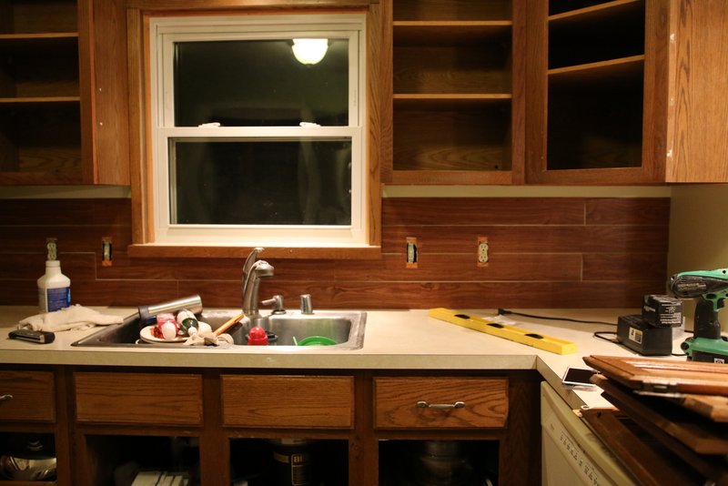 Faux shiplap backsplash with peel 'n stick flooring